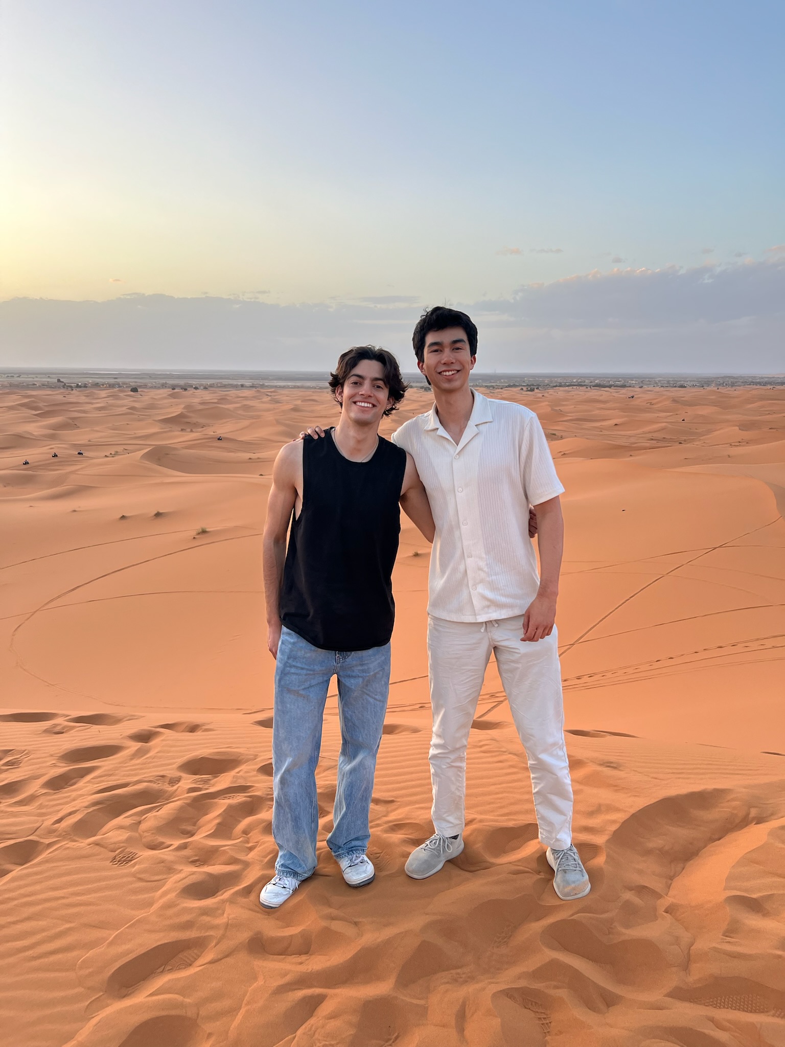 Andre and friend on sand dunes in Morocco