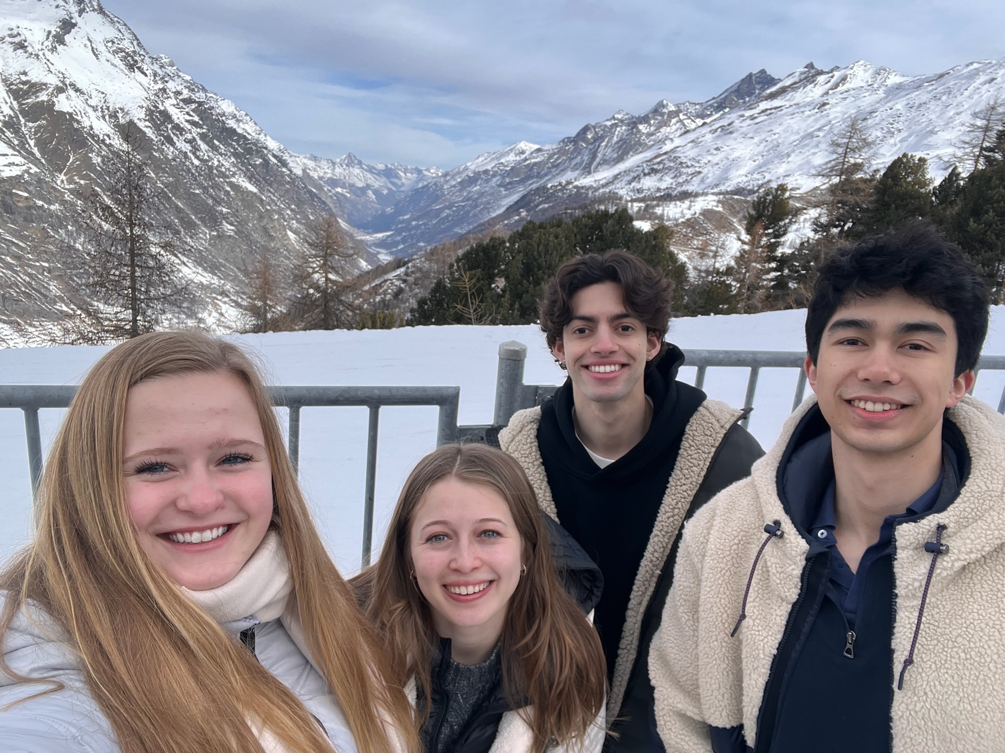 Andre and friends in snowy mountains during study abroad